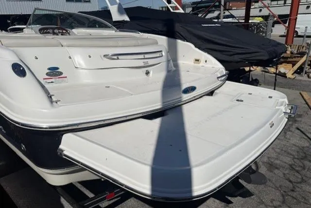 Slide: The Image of 2006 Chaparral 220 SSi boat rear view with extended swim platform. - 21