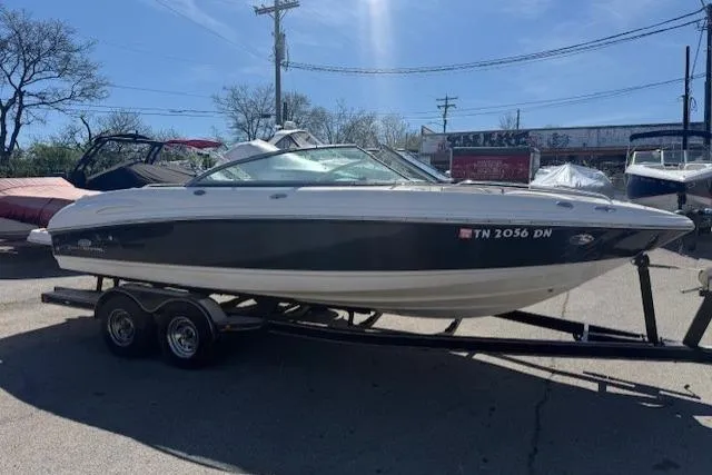 Slide: The Image of 2006 Chaparral 220 SSi boat on trailer in outdoor setting. - 5