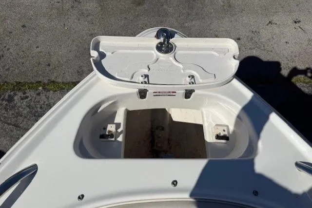 Slide: The Image of Bow storage compartment of a 2006 Chaparral 220 SSi boat, open and empty. - 6