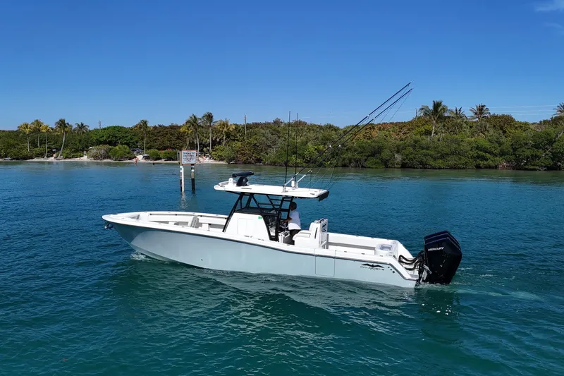 The Image of 2020 Invincible 36 Open Fisherman boat cruising on clear blue water. - 0