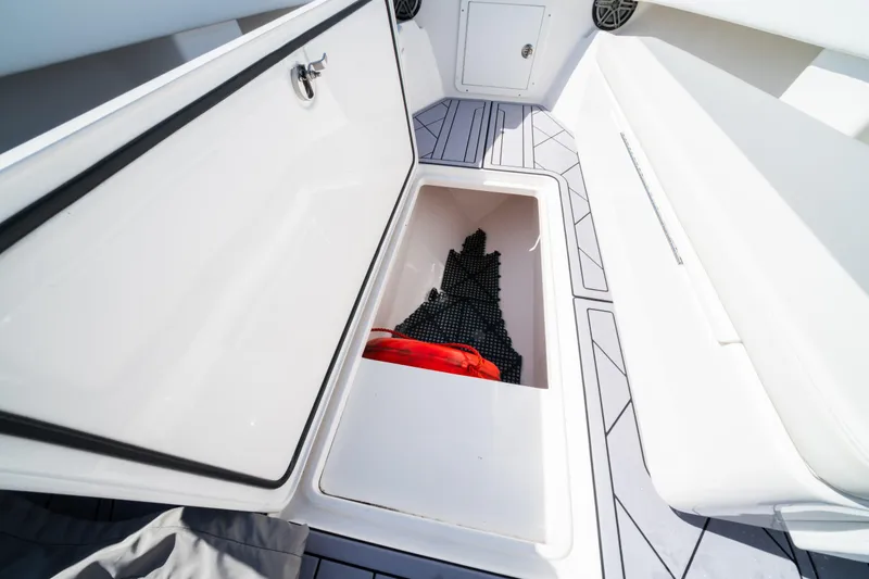 Slide: The Image of Storage compartment on 2020 Invincible 36 Open Fisherman boat, featuring sleek design and ample space. - 10