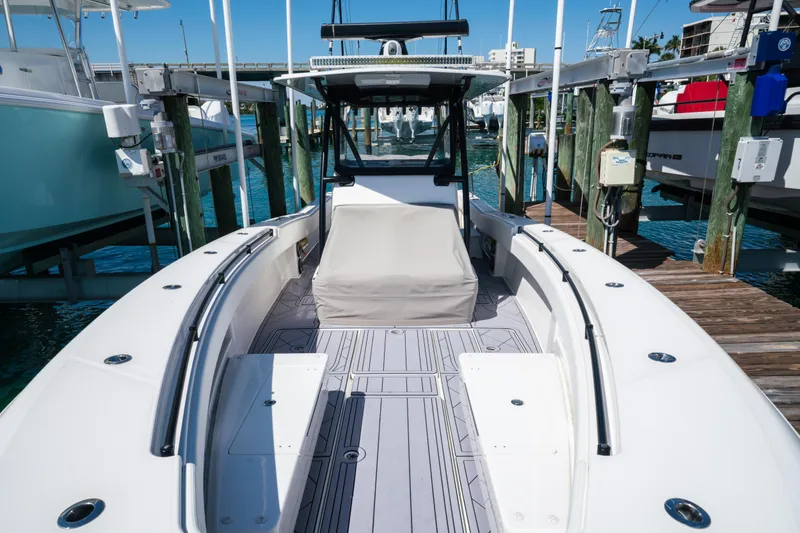 Slide: The Image of 2020 Invincible 36 Open Fisherman at dock, front deck view. - 12