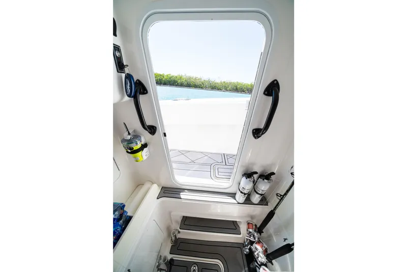 Slide: The Image of Interior view of Invincible 36 Open Fisherman 2020 with water view. - 17