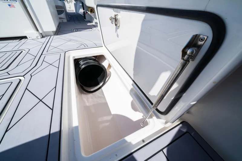 Slide: The Image of Storage compartment on 2020 Invincible 36 Open Fisherman boat, featuring sleek design and functionality. - 21