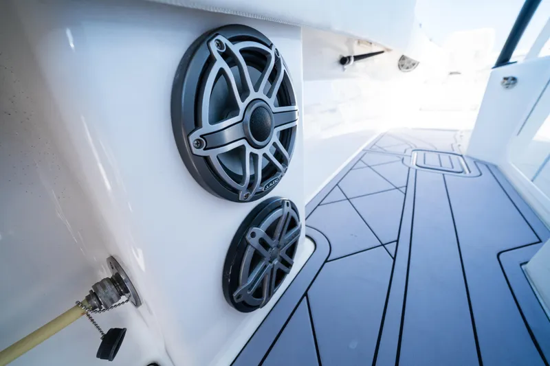 Slide: The Image of 2020 Invincible 36 Open Fisherman boat speakers and deck detail. - 24