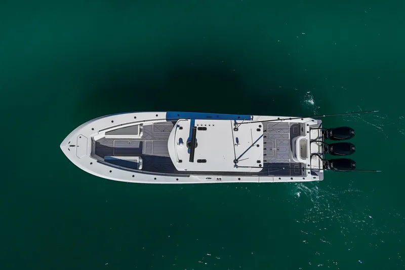 Slide: The Image of Aerial view of 2020 Invincible 36 Open Fisherman boat on clear water. - 28