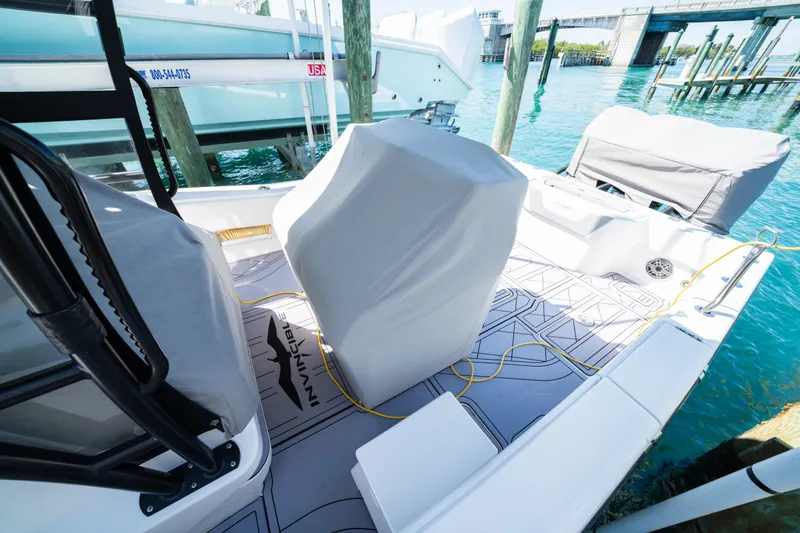 Slide: The Image of Invincible 36 Open Fisherman 2020 at dock, sunny day. - 4