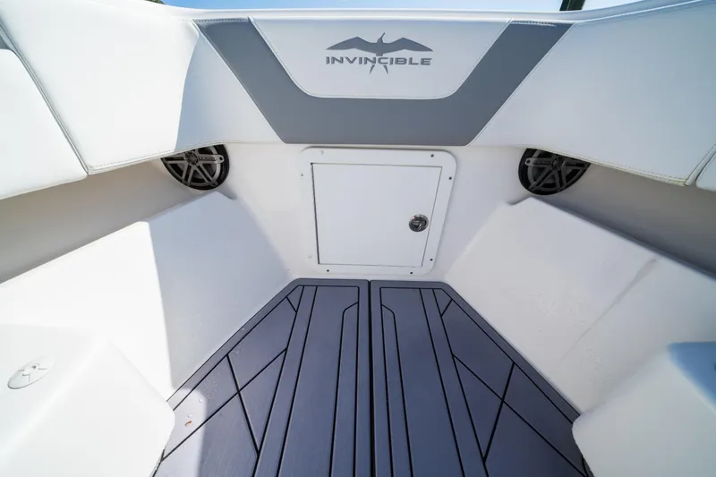 Slide: The Image of Interior view of 2020 Invincible 36 Open Fisherman boat, featuring sleek design and storage compartment. - 7