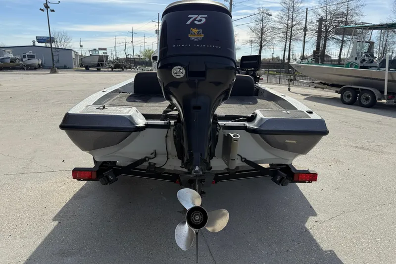 Slide: The Image of Rear view of a 2013 Stratos 176 VLO boat with outboard motor. - 5