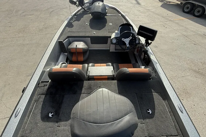 Slide: The Image of 2013 Stratos 176 VLO boat interior with steering wheel and seating. - 7