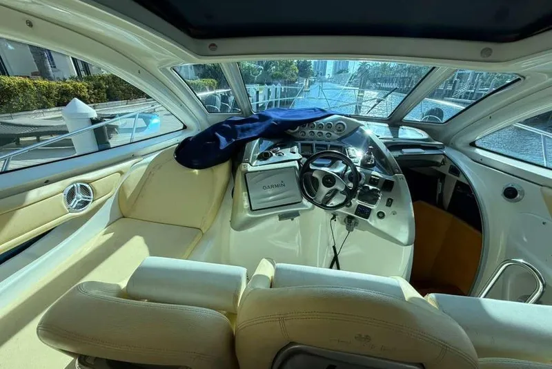 Slide: The Image of Interior view of 2009 Cranchi Mediterranee 43 yacht cockpit with steering wheel and navigation equipment. - 10