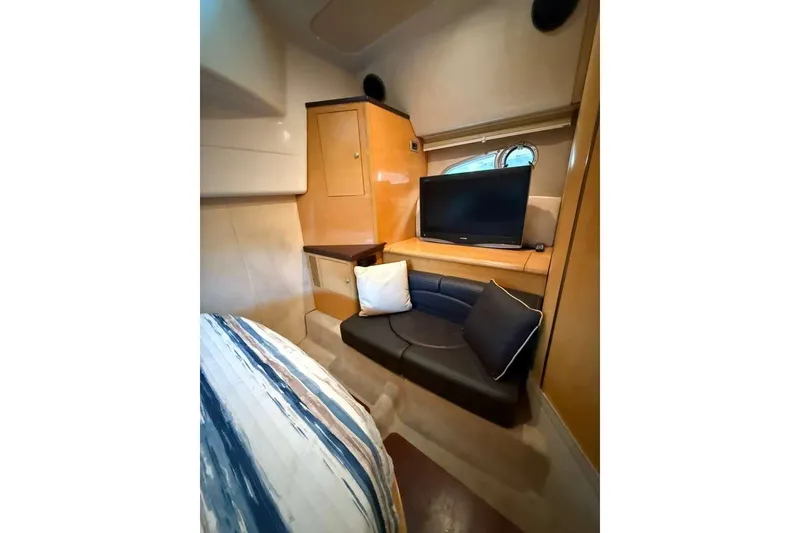 Slide: The Image of Interior of 2009 Cranchi Mediterranee 43 yacht with TV, seating, and storage. - 16