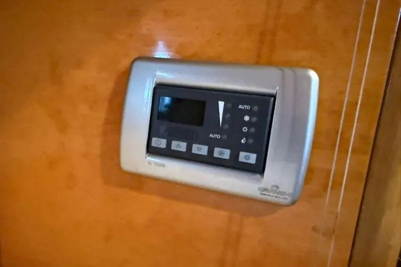 Slide: The Image of Control panel on 2009 Cranchi Mediterranee 43 yacht interior. - 17