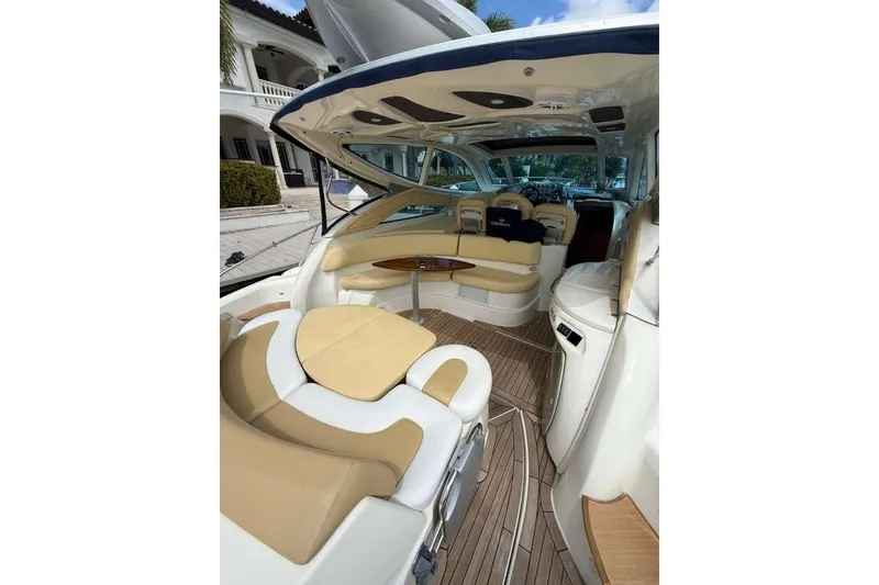 Slide: The Image of Luxurious 2009 Cranchi Mediterranee 43 yacht interior with elegant seating and wooden flooring. - 24
