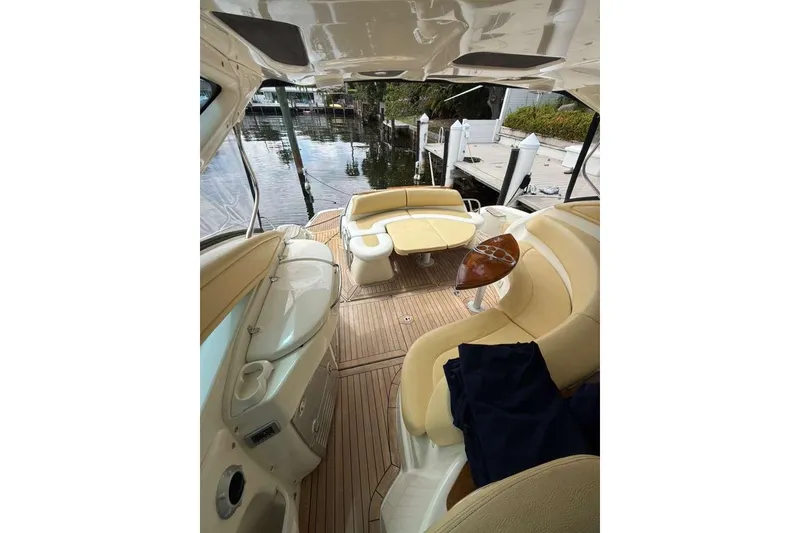 Slide: The Image of Luxurious 2009 Cranchi Mediterranee 43 yacht interior with elegant seating and wooden flooring. - 26