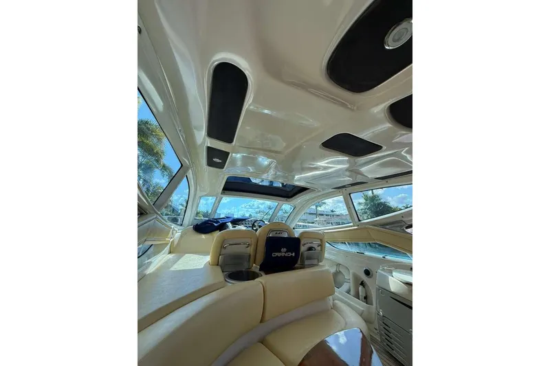 Slide: The Image of Interior view of 2009 Cranchi Mediterranee 43 yacht, featuring luxurious seating and sleek design. - 3