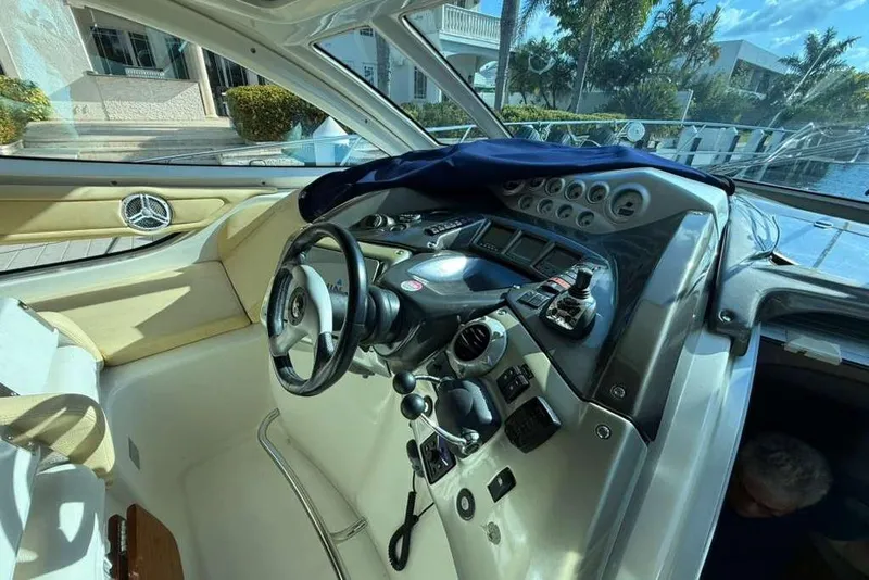 Slide: The Image of Cockpit of 2009 Cranchi Mediterranee 43 yacht with steering wheel and control panel. - 9