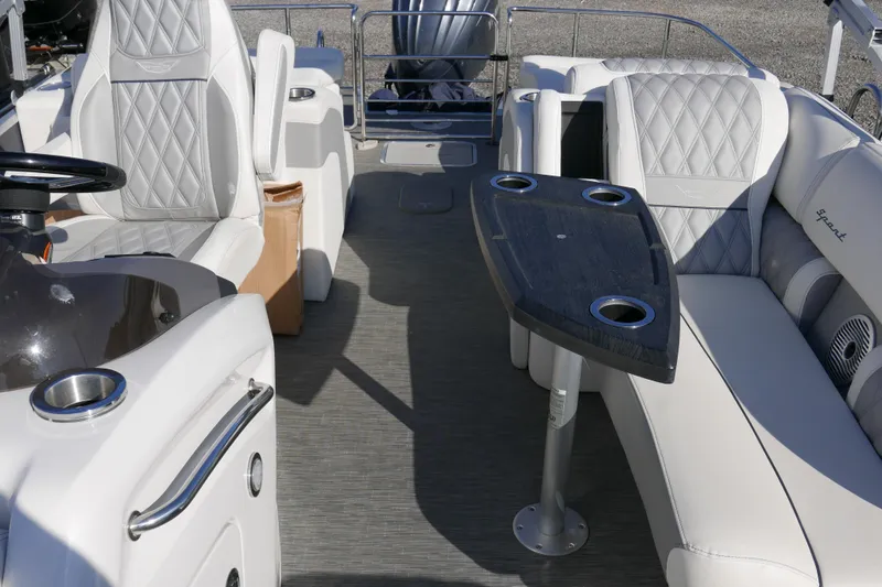 Slide: The Image of 2022 Bennington 23 RCW boat interior with luxurious seating and table. - 10