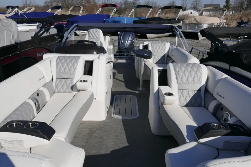 Slide: The Image of Luxurious interior of 2022 Bennington 23 RCW pontoon boat with plush seating. - 6