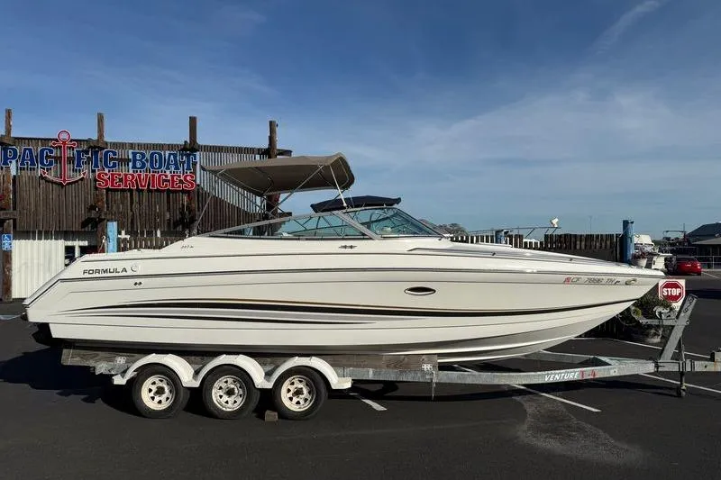 The Image of 1999 Formula 280 Sun Sport boat on trailer at Pacific Boat Services. - 1