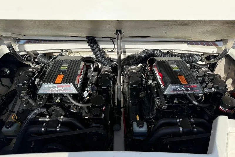 Slide: The Image of Twin MerCruiser engines in a 1999 Formula 280 Sun Sport boat. - 9