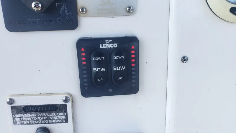 Slide: The Image of Lenco control panel on 2009 Triton 225 CC boat. - 12
