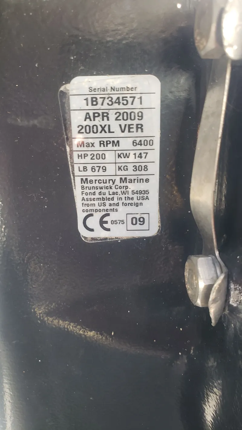 Slide: The Image of Label on a 2009 Triton 225 CC boat engine. - 46