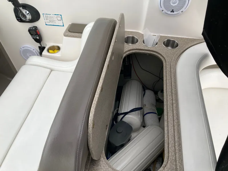 Slide: The Image of Interior of a 2007 Rinker 280 Express Cruiser with storage compartment. - 21