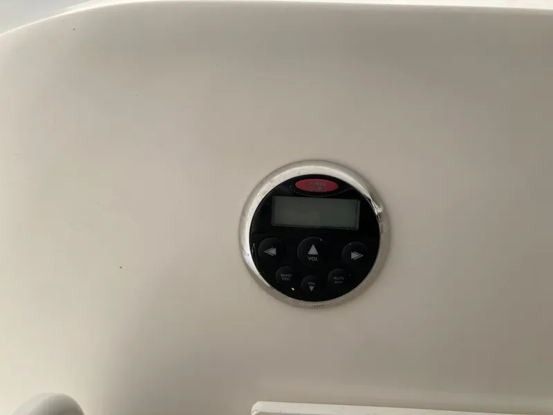 Slide: The Image of Control panel on a 2007 Rinker 280 Express Cruiser. - 24