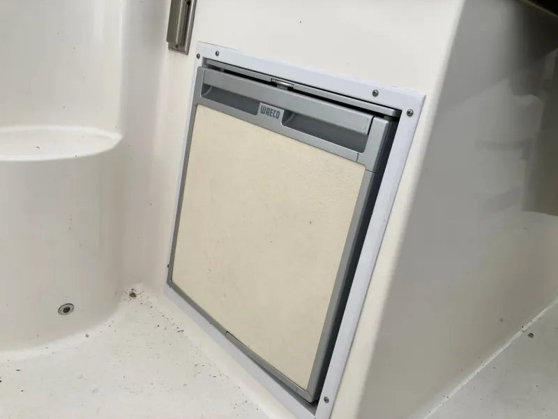 Slide: The Image of Refrigerator on a 2007 Rinker 280 Express Cruiser boat. - 26