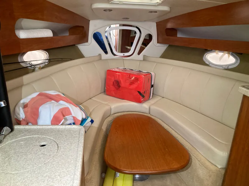 Slide: The Image of Interior of 2007 Rinker 280 Express Cruiser with seating area. - 39