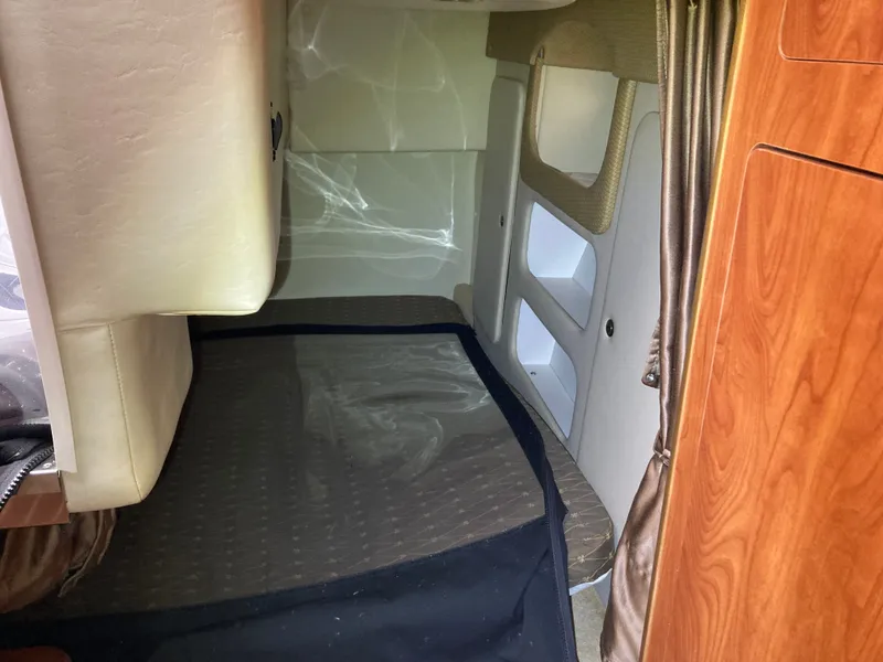 Slide: The Image of Interior of 2007 Rinker 280 Express Cruiser with sleeping area. - 46