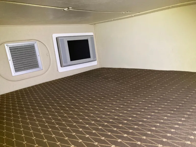 Slide: The Image of Interior of 2007 Rinker 280 Express Cruiser with TV and ventilation. - 47