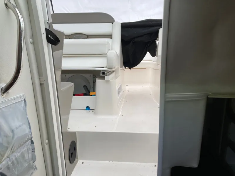 Slide: The Image of Interior of a 2007 Rinker 280 Express Cruiser boat. - 49