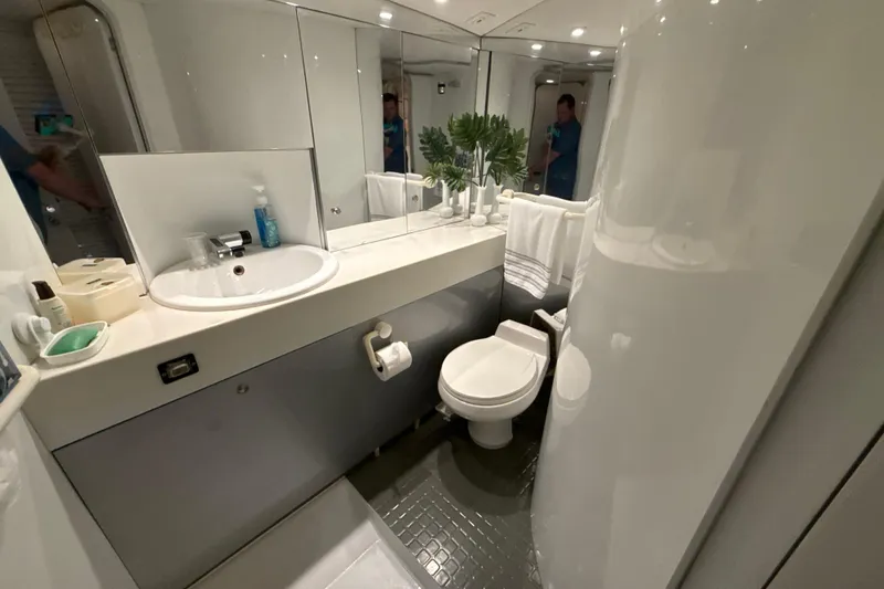 Slide: The Image of Luxurious yacht bathroom with modern fixtures, white sink, and elegant decor, Diaship 53, 1999. - 20
