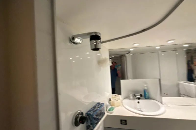 Slide: The Image of Bathroom interior of a 1999 Diaship 53 yacht with sink and mirror. - 22