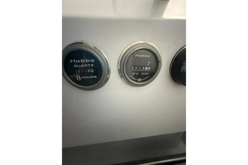 Slide: The Image of Hobbs quartz hour meters on Diaship 53, 1999 model, displaying total hours. - 24