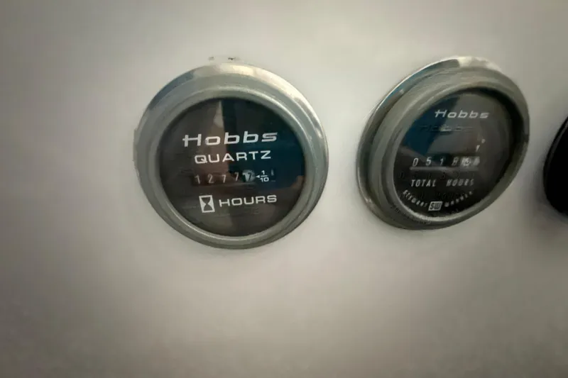 Slide: The Image of Hobbs quartz hour meters on a 1999 Diaship 53 dashboard. - 34