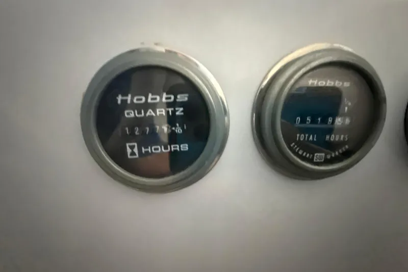 Slide: The Image of Hobbs quartz hour meters on Diaship 53, 1999 model, displaying total hours. - 35