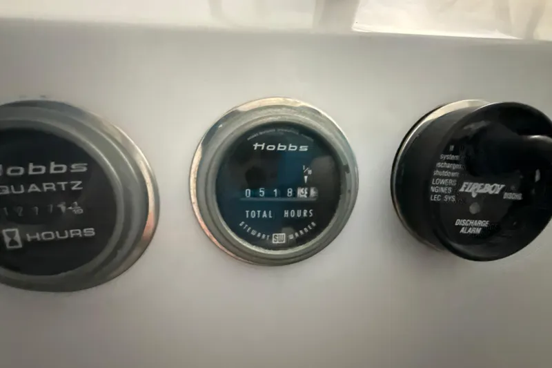 Slide: The Image of Close-up of Diaship 53 1999 dashboard gauges displaying hours and discharge alarm. - 36