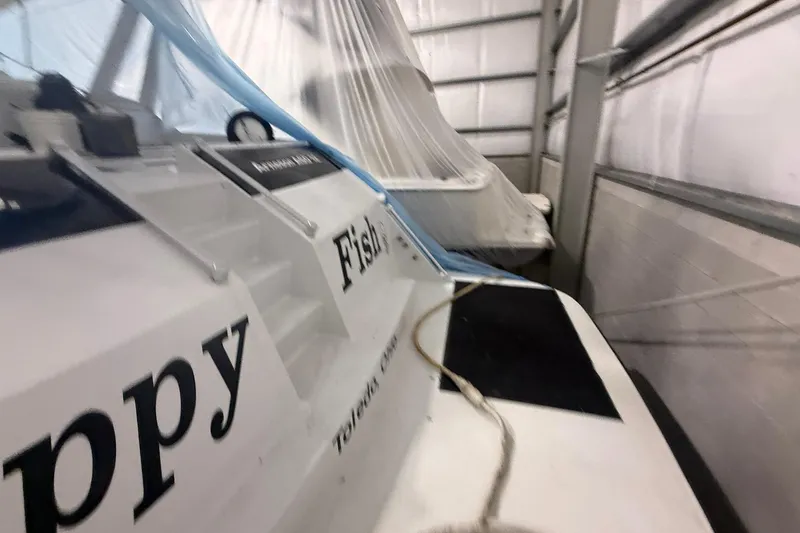 Slide: The Image of Boat named "Happy Fish" in storage, Diaship 53 model, 1999. - 66