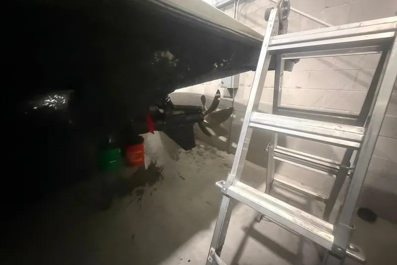 Slide: The Image of Ladder beside Diaship 53 yacht propeller in a garage, 1999 model. - 78