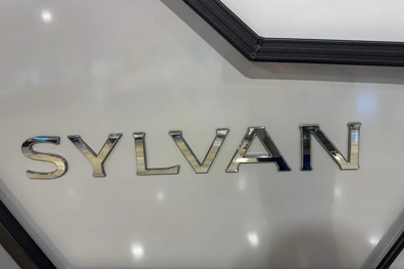 Slide: The Image of 2026 Sylvan A20 logo in chrome on a sleek surface. - 7