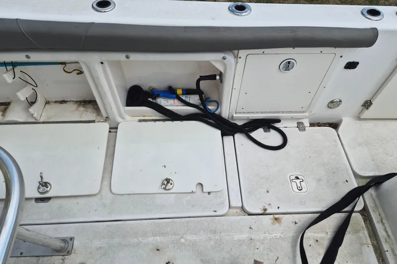 Slide: The Image of 2006 Century 2900 Center Console boat deck with storage compartments and equipment. - 7