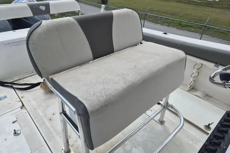 Slide: The Image of 2006 Century 2900 Center Console boat seat with stainless steel frame. - 8