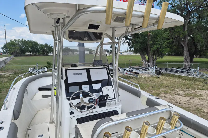 Slide: The Image of 2006 Century 2900 Center Console boat with advanced navigation system and rod holders. - 9