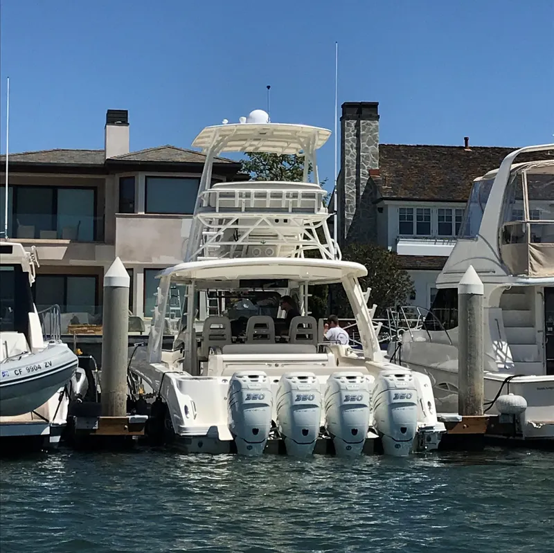 Slide: The Image of 2018 Boston Whaler 420 Outrage docked with quad engines. - 4