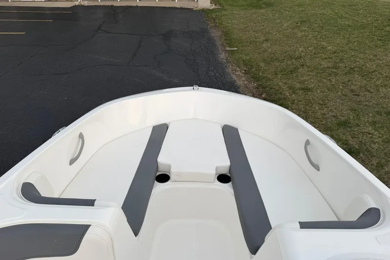 Slide: The Image of 2026 Bayliner Element E16 boat interior with gray and white seating. - 10