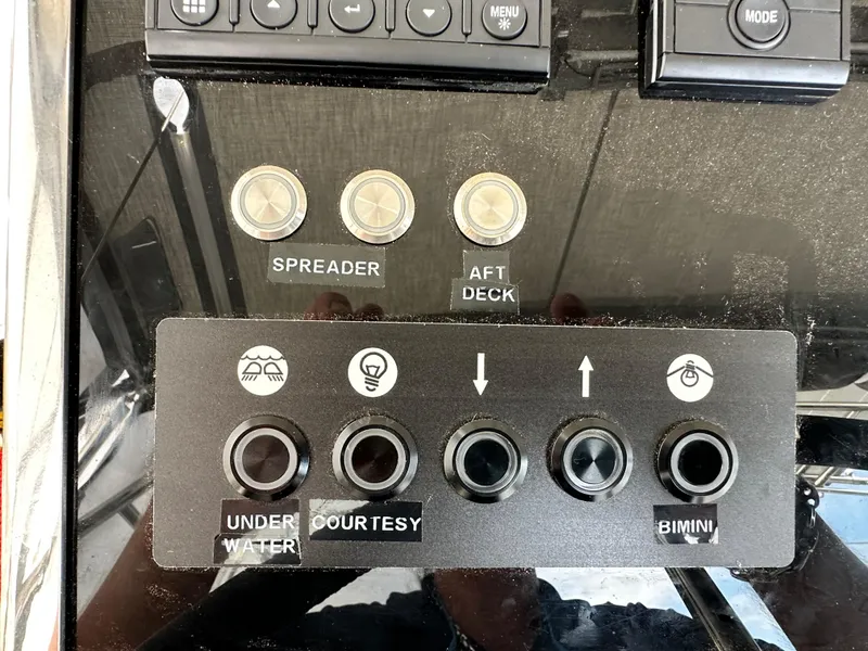 Slide: The Image of Control panel of 2023 Beneteau Oceanis 46.1 yacht with labeled buttons. - 25