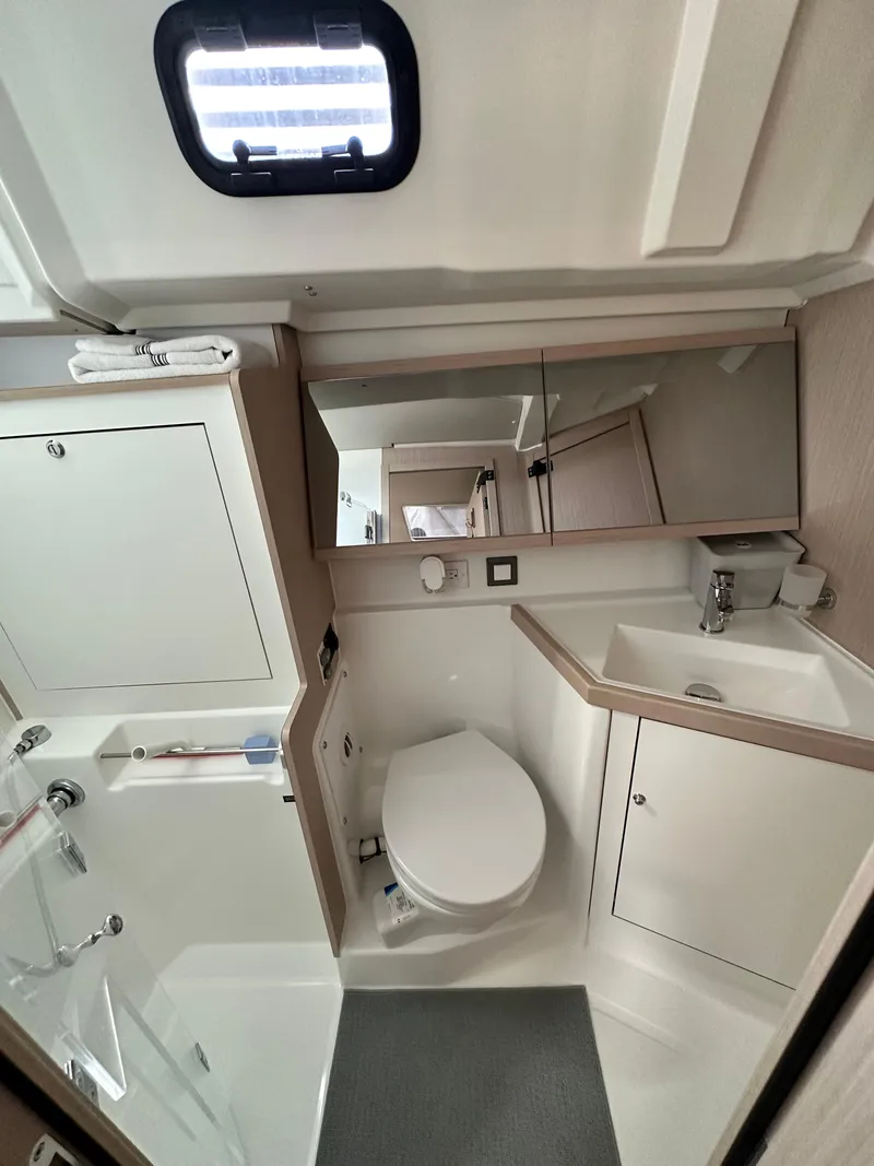 Slide: The Image of Modern bathroom in 2023 Beneteau Oceanis 46.1 yacht, featuring sleek fixtures and ample storage. - 46
